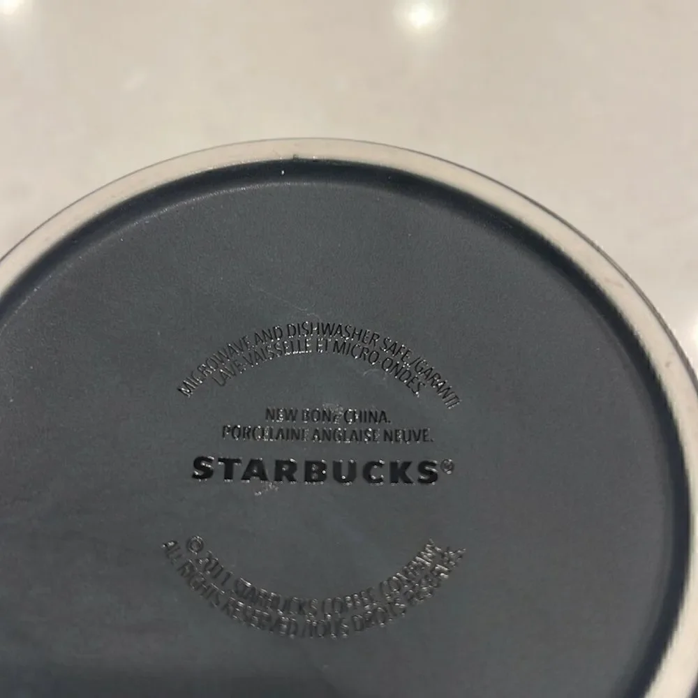 Starbucks French roast new bone china 2011 coffee cup brown on inside, nice feel